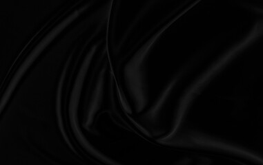 Black gray satin dark fabric texture luxurious shiny that is abstract silk cloth background with patterns soft waves blur beautiful.