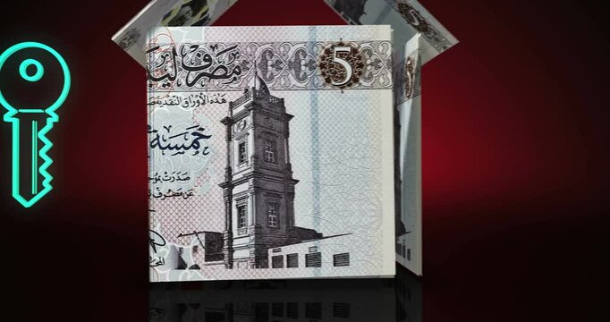 Libya dinar 5 LYD money banknotes paper house on the table with key and family icon. Libyan currency notes 3D concept of home mortgage loan, costs and real estate wealth financing.