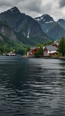 Fototapeta premium Norwegian Fjords on a Cloudy Day with Dramatic Cliffs and Calm Waters