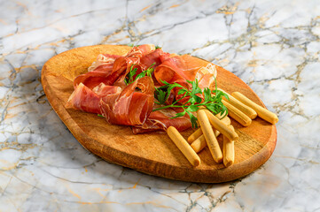 Ham and Breadsticks Appetizer on Oval Board