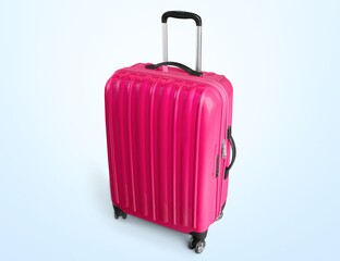 Colored plastic luggage suitcase on background