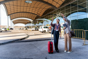 Two European businesswomen at the airport