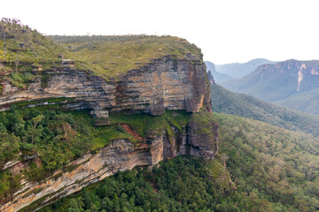 Photograph of bushland and the natural amphitheatre of the scenic Grose Valley near Blackheath in the Blue Mountains in New South Wales, Australia.