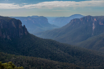 Photograph of bushland and the natural amphitheatre of the scenic Grose Valley near Blackheath in the Blue Mountains in New South Wales, Australia.