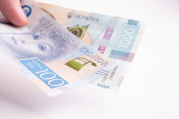 Swedish krona,Currency of Ukraine, US dollar, euro the currency of Sweden.money concept. 100. 20. Close up
