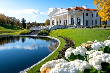 Obraz premium A picturesque view of the UÅ¾utrakis Manor Estate, with its neoclassical architecture and beautiful gardens