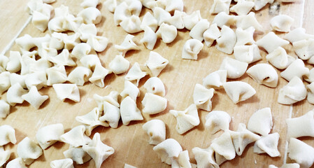 Meaty manti. Traditional Turkish food manti made on wood. 