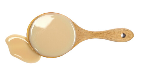 Nature oat calcium drink in wooden spoon, puddle isolated on white, clipping path