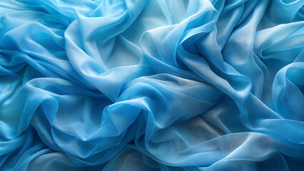 Fototapeta premium Soft Folds in Blue Organza Fabric for Elegant Design