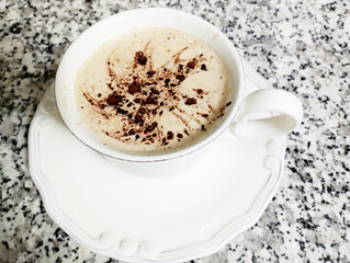 coffee latte cappuccino in white coffee cup