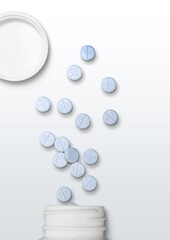 Set of tablets in medicine bottle on color background