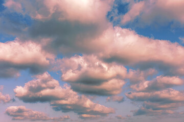 A sky with beautiful, soft pink clouds.
