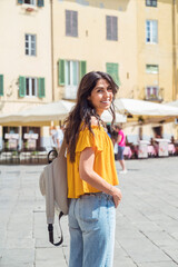 Beautiful smiling  woman on the street in Italy 