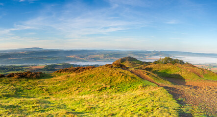 Naklejka premium A panoramic view from the top of the Wrekin Hill in Shropshire, UK looking south west towards Brown Clee hill and the Shropshire Hills