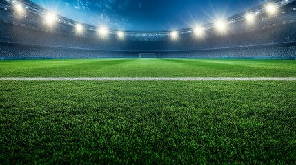 Obraz premium Floodlit Soccer Stadium with Lush Green Grass Field and Bright Spotlights