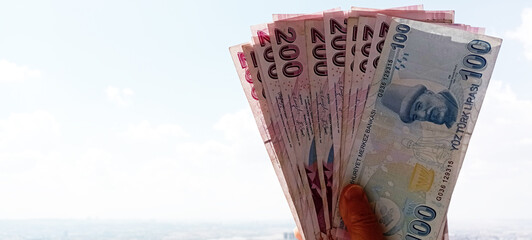 Background of Turkish lira. Turkish money. 50, 100 and 200 tl notes. Banner for website, desktop...