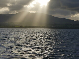 sunrays over mountain in stormy weather in Sainte rose, Basse terre, guadeloupe seen from grand cul...