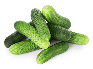 Pile of whole fresh cucumbers isolated on white