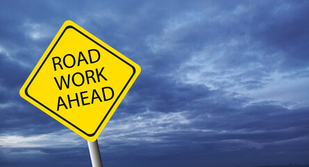 road work ahead sign on sky background