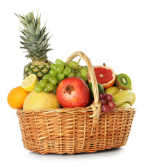 Many different fresh fruits in wicker basket isolated on white