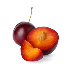 Whole and cut ripe plums isolated on white