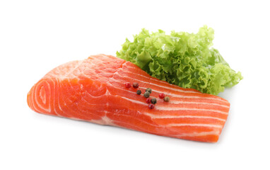 Piece of fresh salmon, peppercorns and lettuce isolated on white