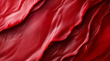 Obraz premium A close-up of a red fabric, textured with a cloth-like material, appearing authentic and genuine