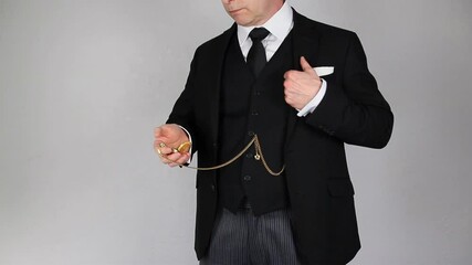 Vintage Businessman in Suit Looking at Pocket Watch. Wealthy Bank Manager Concept.