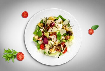 Caesar salad dish with fresh vegetables