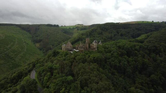Exploring Bourscheid Castle nestled in the lush hills of Luxembourg