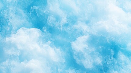 Obraz premium A tight shot of a blue-and-white cloud with a black bird perched in its midst