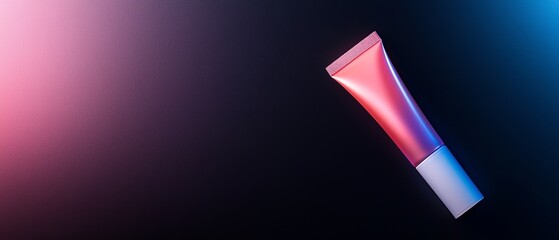  Close-up of toothpaste tube against black backdrop, framed by pink and blue rectangle
