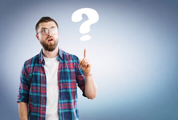 Worried young sad man with a question mark