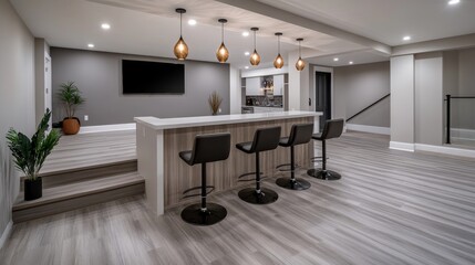 This stylish finished basement includes light grey vinyl flooring, a compact home theater area, and a bar with seating, perfect for hosting friends and family