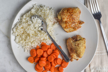 chicken thighs   with carrots and rice
