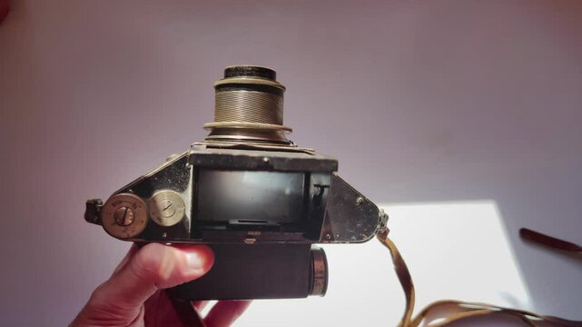 Old vintage rangefinder film camera on the table