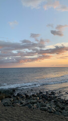 Sunset Over Calm Ocean Waves
