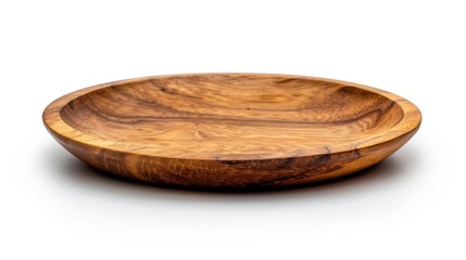 Obraz premium A simple still life image of a wooden bowl placed on a white surface