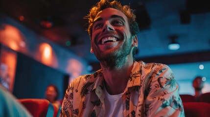 Obraz premium A person sits and smiles while watching a film at the cinema