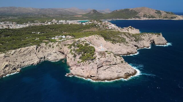 Aerial view of Capdepera Lighthouse on rugged Coastline, Mallorca	