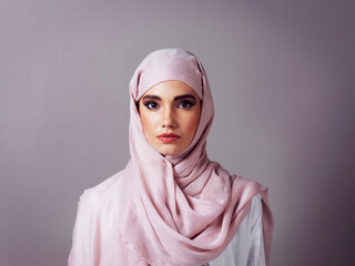 Hijab, raya and portrait with Muslim woman in studio for islamic fashion, arabic culture and modest clothes. Scarf, eid Mubarak celebration and elegance with person on background for religion