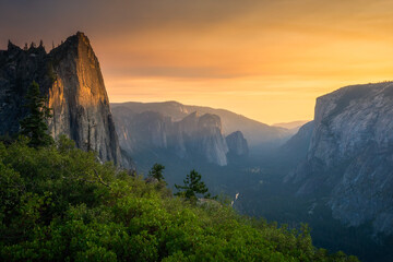 hiking the four mile trail at sunset in yosemite national park, california