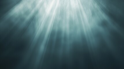 Fototapeta premium Graceful sun rays penetrate deep blue water, creating stunning light effects in the underwater world. Abstract patterns evoke tranquility and serenity, inviting calm contemplation