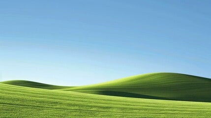 Rolling green hills under a clear blue sky.