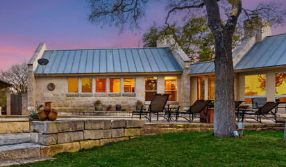 Relaxing evening at a serene countryside home with beautiful sunset and outdoor seating area