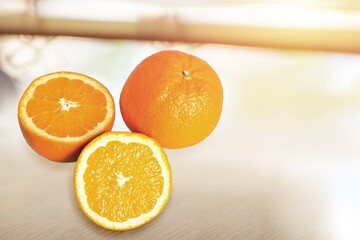 Fresh ripe juicy orange fruit with leaves