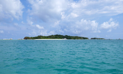 Tropical island paradise in the middle of crystal clear waters