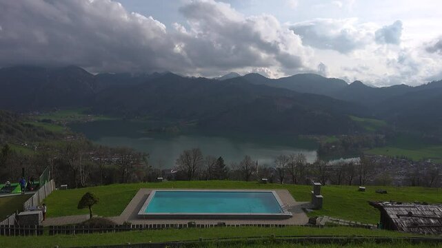 View of mountains and mountain lake in summer. Beautiful town of Schliersee in Bavaria, Germany, Europe. Lake Schliersee in bavarian mountain range. Upper Bayern. Panarama auf den Schliersee. 