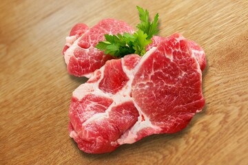 Tasty fresh meat raw steaks on  desk