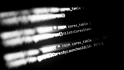 Close-up of programming code on a black background, showcasing the complexity of software development. Ideal for technology themes.